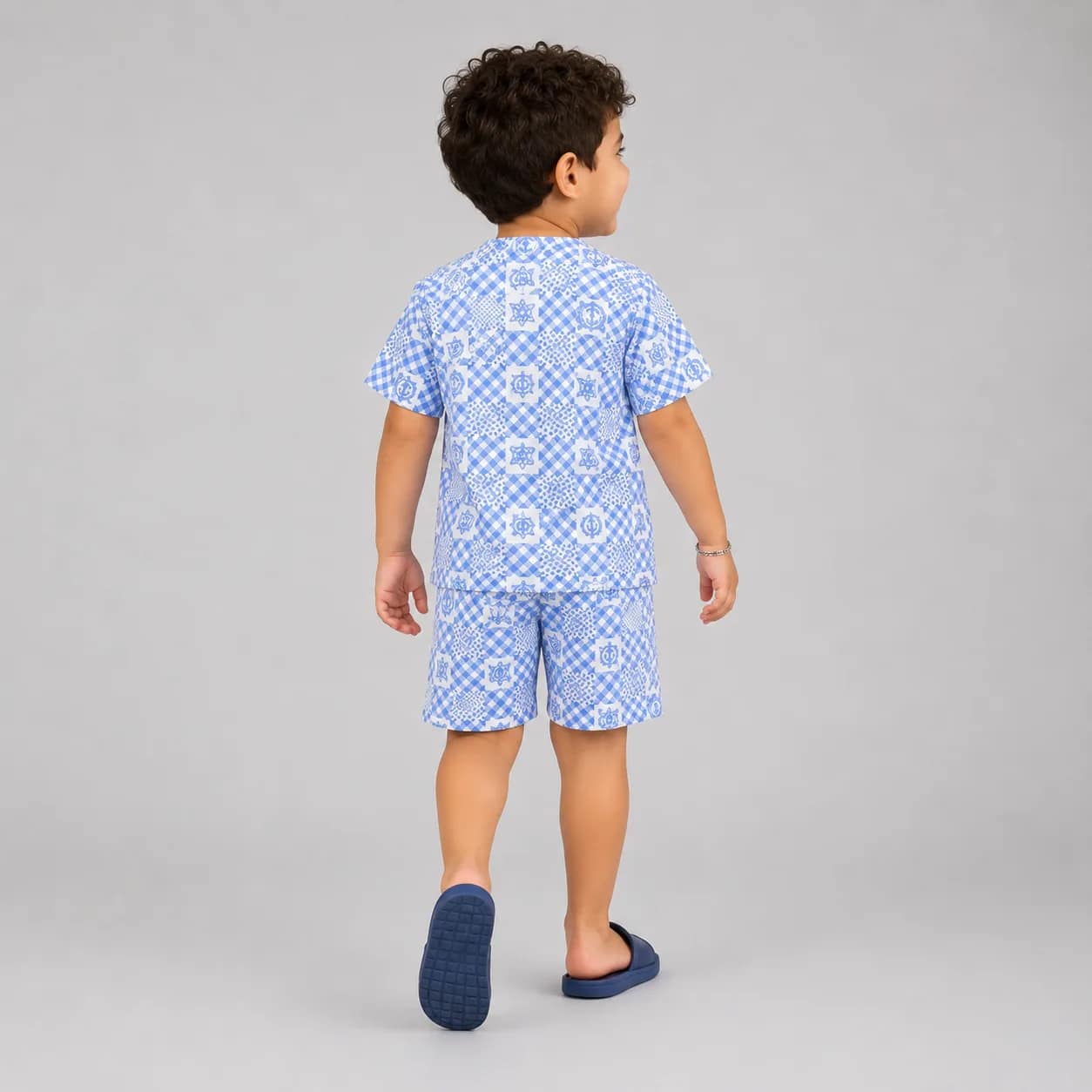 pyjama21 Ensemble garçon bleu motifs géométriques, pyjama confortable à manches longues, idéal pour la nuit.