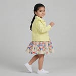 ensemble veste pistach et robe fleuri